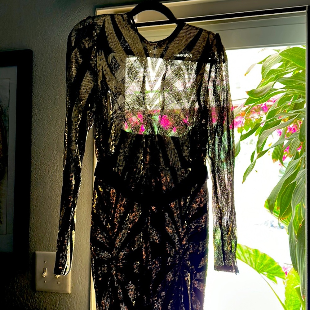 Cleaning my closet but beautiful dress you’ll make an statement.